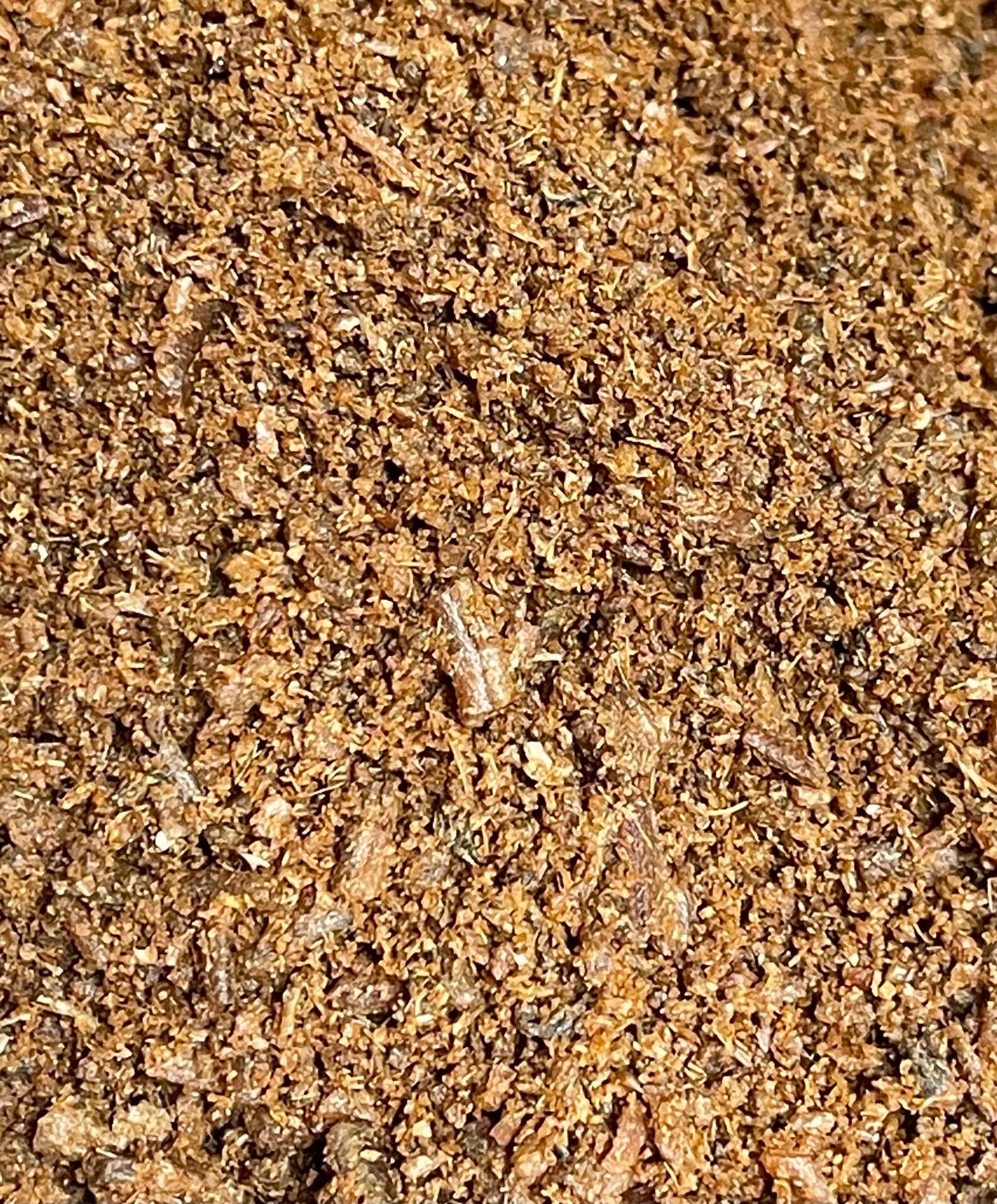 Close-up of natural Canadian smelt meal topper inside the jar